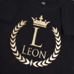 Koszulka czarna z krótkim rękawem złoty wieniec z imieniem Leon rozmiar 86