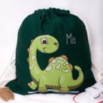 Zielony worek z dinozaurem i imieniem dziecka
