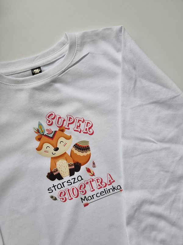 Koszulka biała długi rękaw super starsza siostra  Marcelinka  rozmiar 116