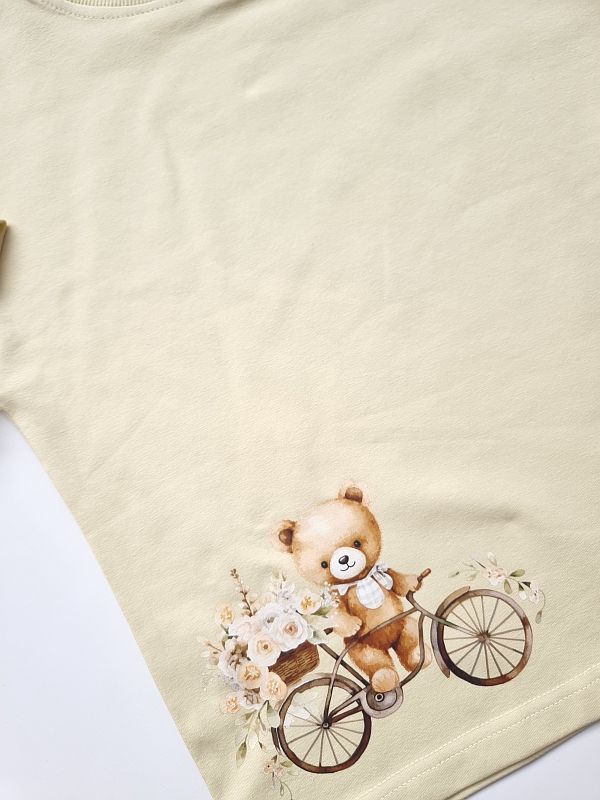 Koszulka masełkowa krótki rękaw miś na rowerze rozmiar 116