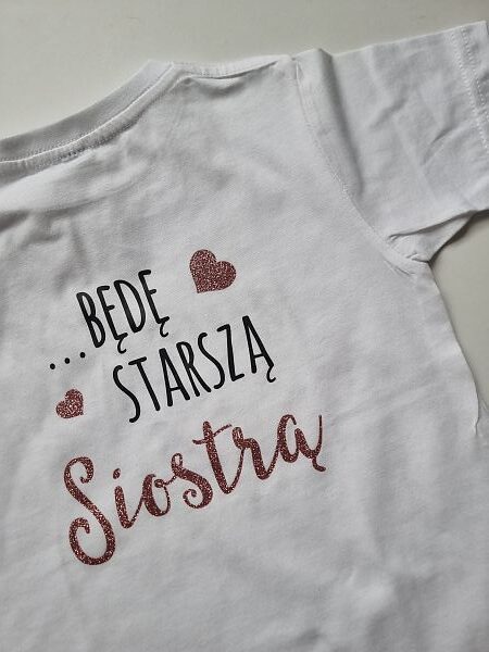 Koszulka biała krótki rękaw przód mam sekret tył będę starszą siostrą rozmiar 122