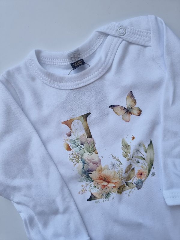 Body białe długi rękaw kwiatowy inicjał L rozmiar 68