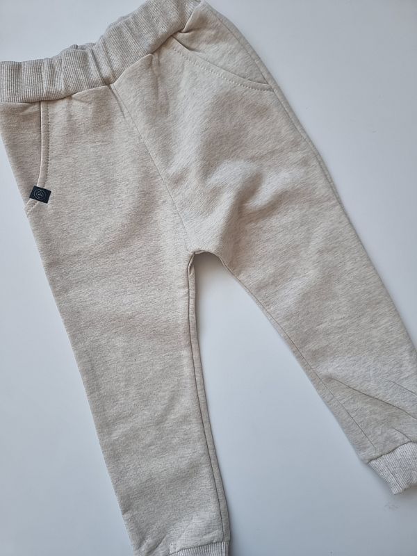 Spodnie dresowe beż melanż rozmiar 92