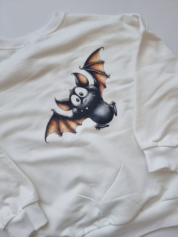 Bluza ecru nietoperz na plecach rozmiar 104