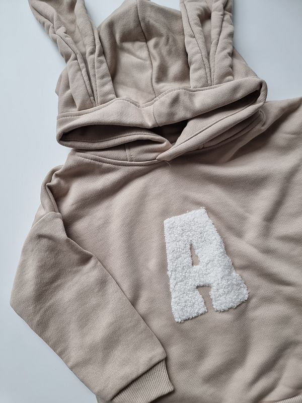 Bluza beżowa z uszami króliczka z inicjałem pluszowym A rozmiar 98