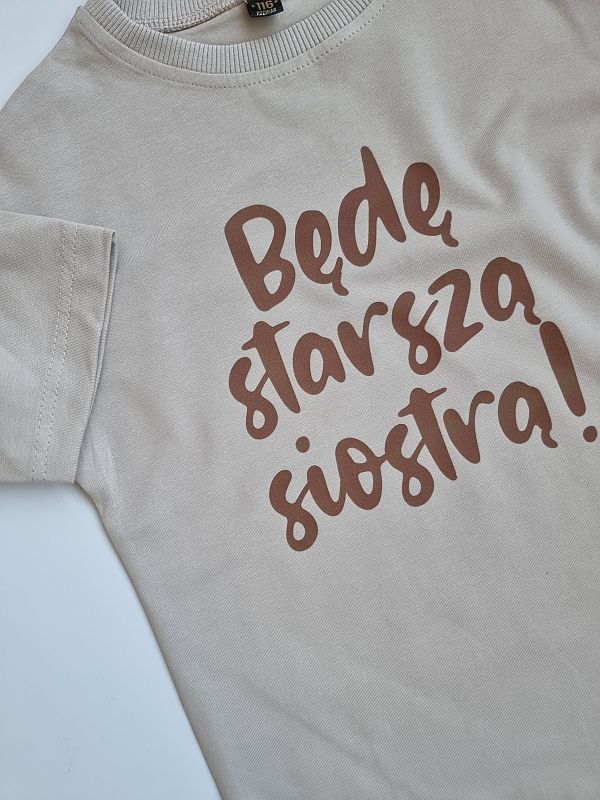 Koszulka beżowa krótki rękaw będę starszą siostrą rozmiar 116