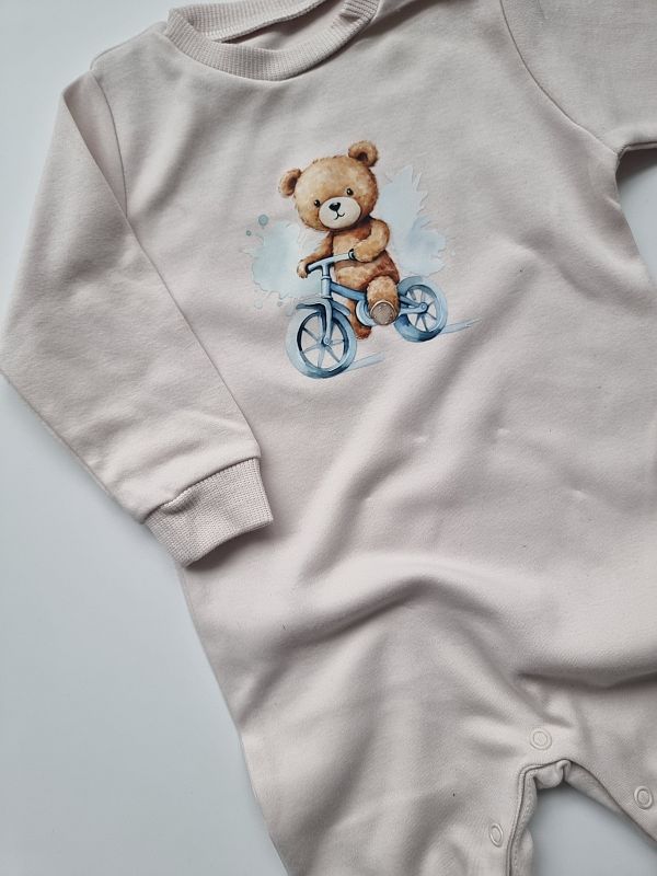 Pajac bez stópek beżowy miś na rowerze rozmiar 74