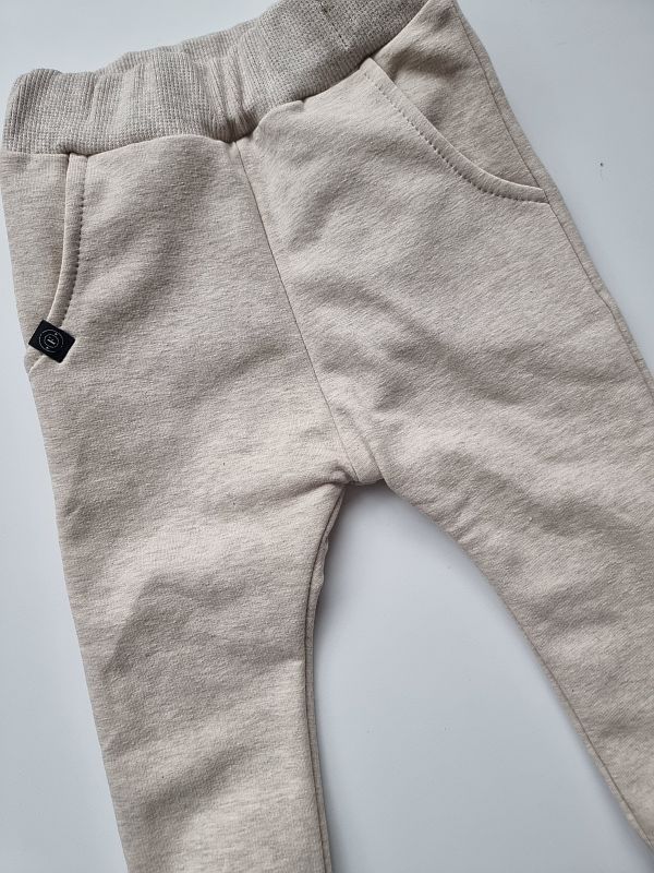 Spodnie dresowe beż melanż rozmiar 80