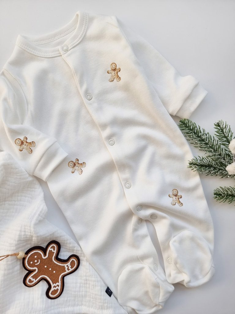 Pajacyk niemowlęcy ze stópkami pierniczki