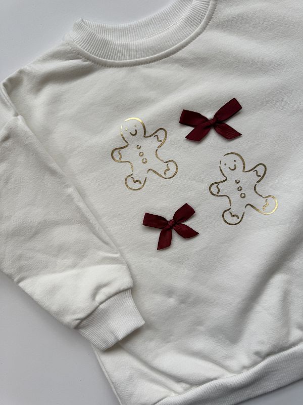 Bluza ecru pierniczki i kokardki rozmiar 86