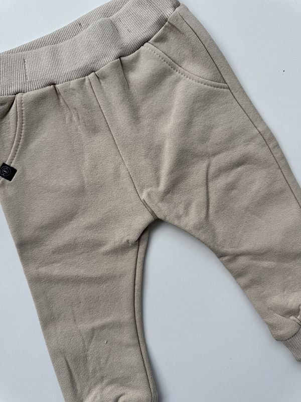 Spodnie dresowe beżowe rozmiar 74