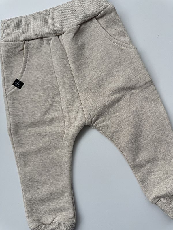 Spodnie dresowe beż melanż rozmiar 74