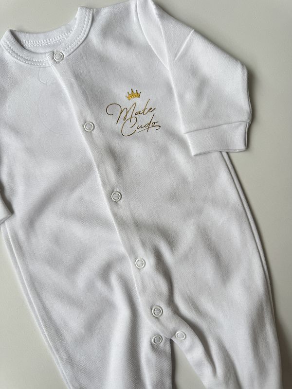 Pajac ze stópkami biały małe cudo rozmiar 56