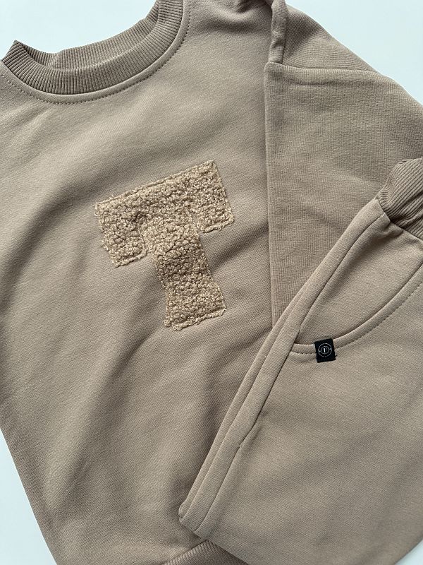 Komplet beźowy bluza + spodnie dresowe pluszowy inicjał T rozmiar 98