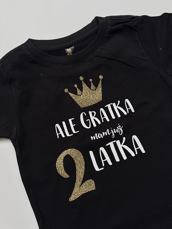 Koszulka czarna krótki rękaw ale gratka mam już 2 latka rozmiar 98