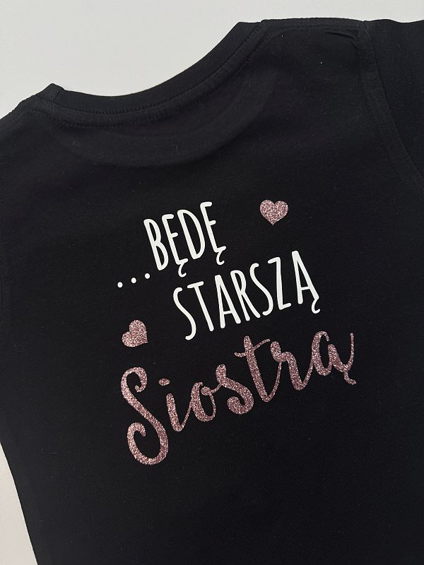 Koszulka czarna krótki rękaw nadruk dwustronny mam sekret będę starszą siostrą rozmiar 104