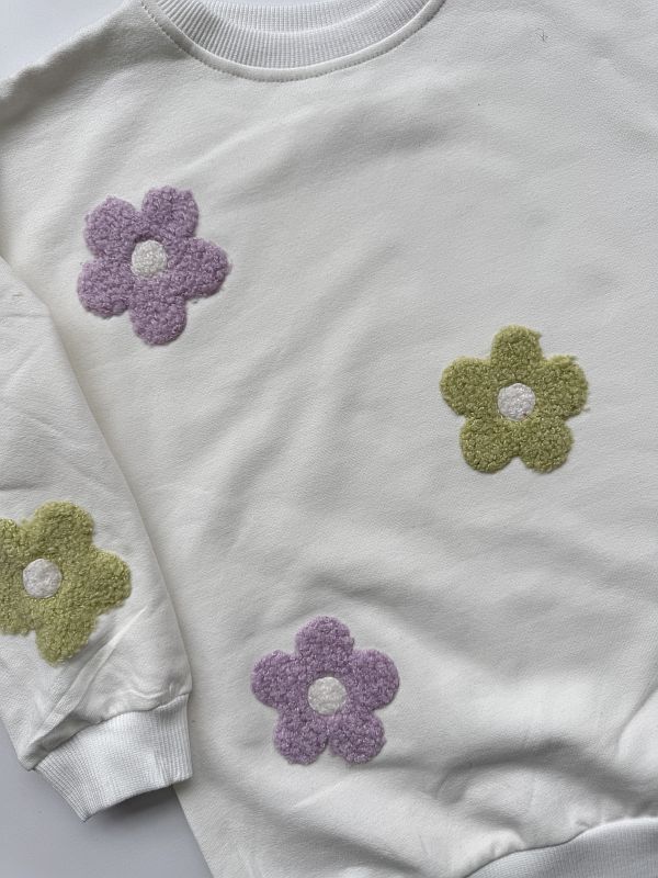 Bluza ecru w pluszowe kwiaty rozmiar 122