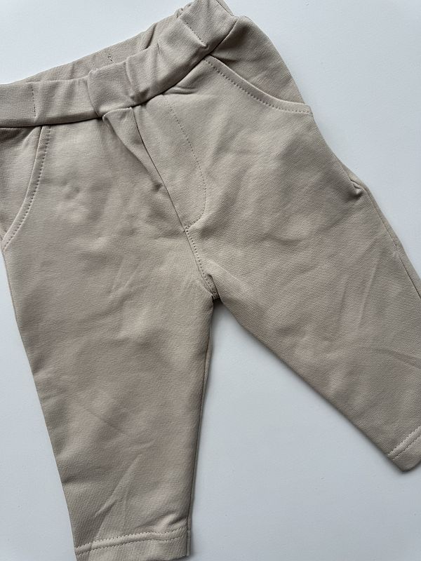 Spodnie dresowe beżowe rozmiar 74