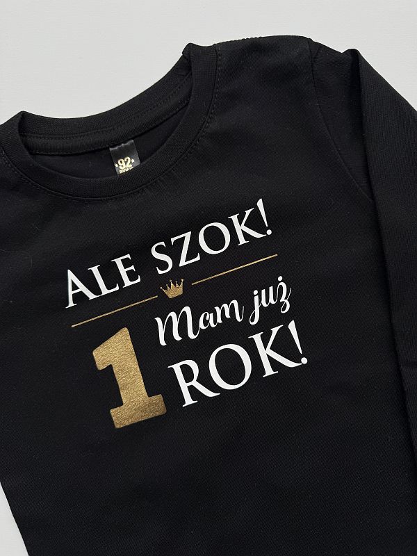 Koszulka czarna długi rękaw ale szok mam juz 1 rok rozmiar 92