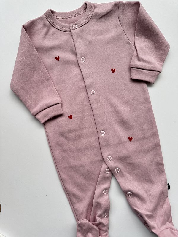 Pajac ze stópkami różowy w serduszka rozmiar 68