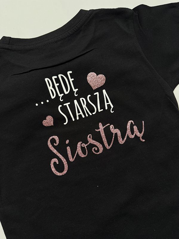 Koszulka czarna krótki rękaw nadruk dwustronny mam sekret będę starszą siostrą rozmiar 116