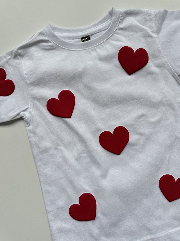Koszulka z serduszkami rozmiar 110