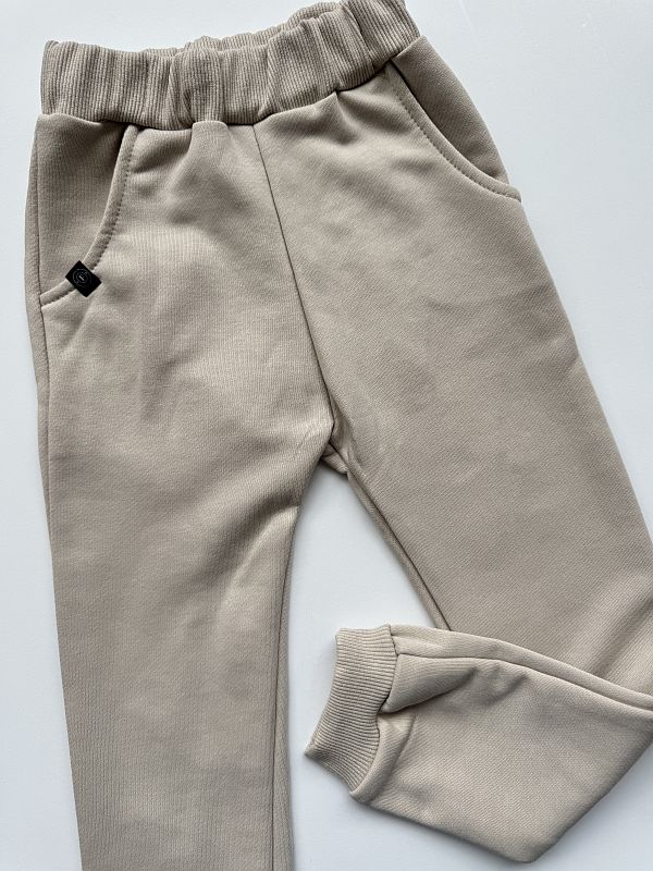 Spodnie jasny beż rozmiar 110