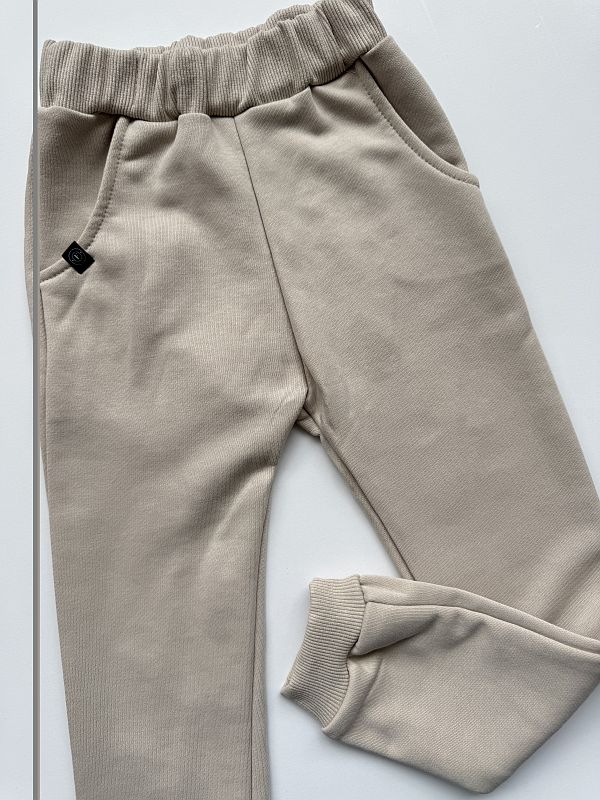 Spodnie jasny beż rozmiar 110