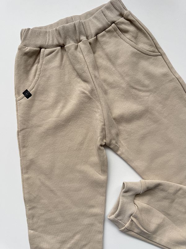 Spodnie dresowe beżowe rozmiar 128