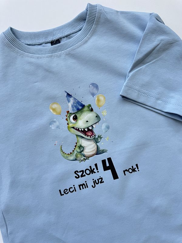 Koszulka niebieska szok leci mi już 4 rok rozmiar 104
