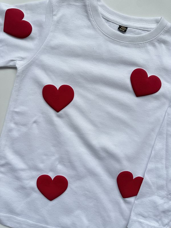 Koszulka biała z długim rękawem w serca rozmiar 110