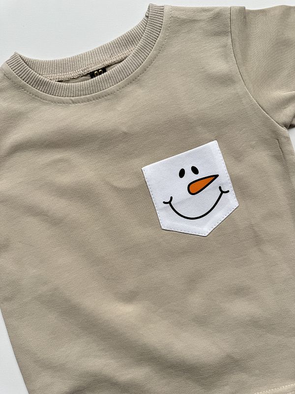 Koszulka beżowa z krótkim rękawem kieszonka z buzią bałwanka rozmiar 92