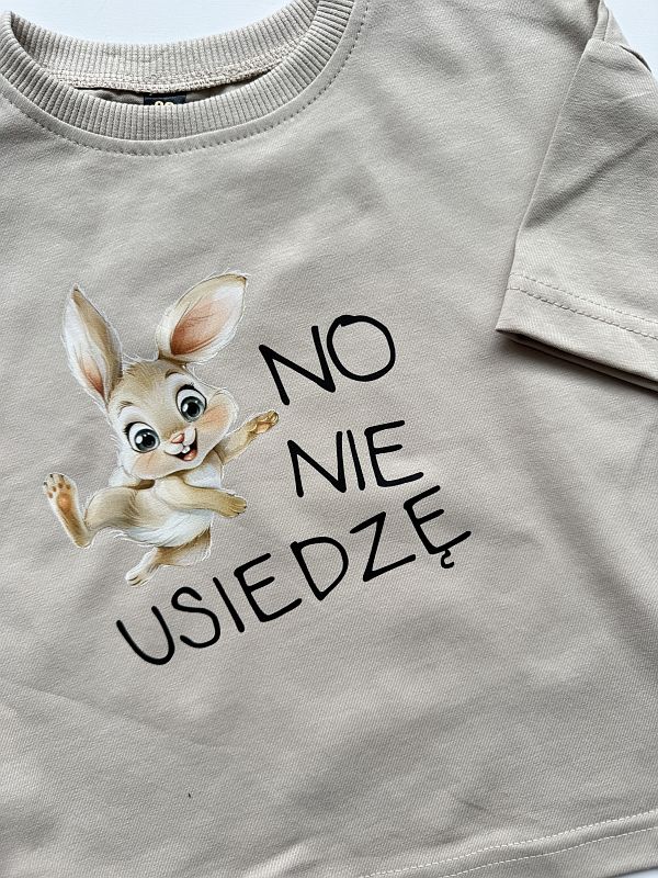 Koszulka beżowa z krótkim rękawem no nie usiedzę rozmiar 86