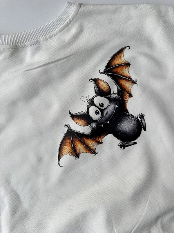 Bluza ecru nietoperz na plecach rozmiar 104