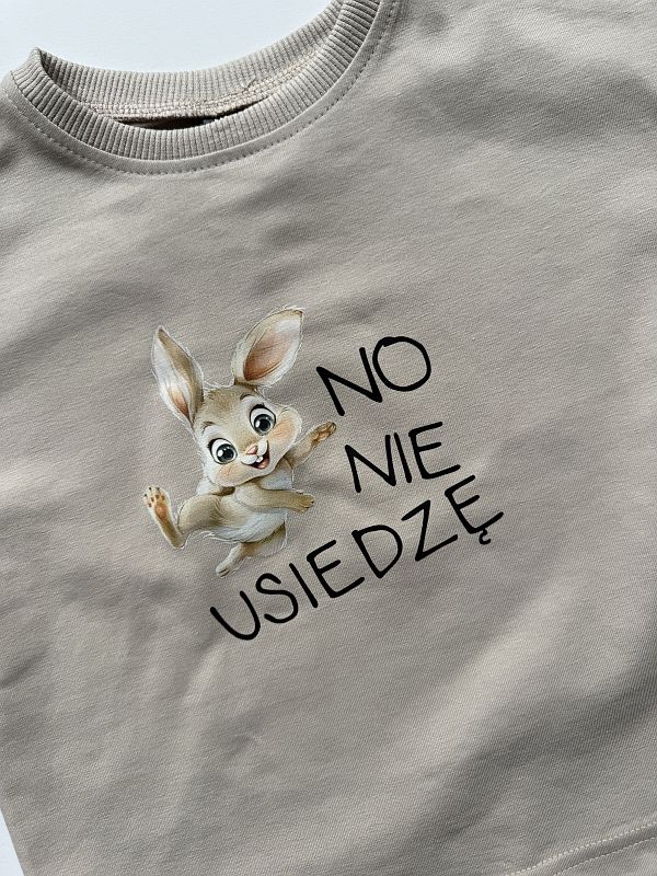 Koszulka beżowa z krótkim rękawem no nie usiedzę rozmiar 86