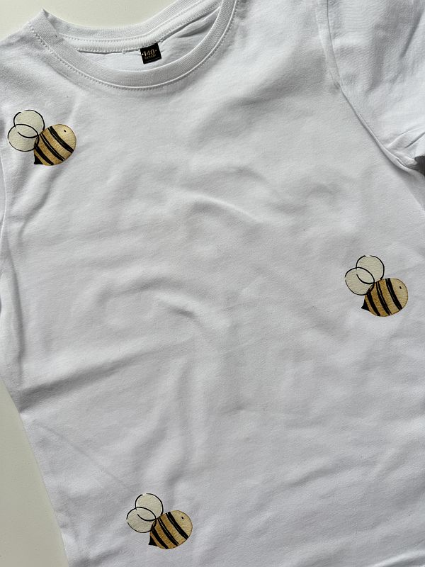 Koszulka biała z krótkim rękawem pszczółki rozmiar 140