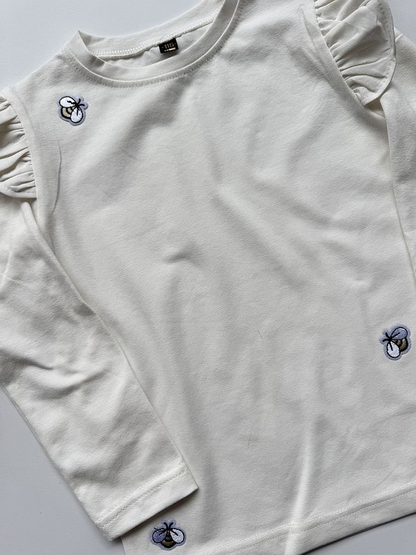 Koszulka ecru z długim rękawem naszywki pszczółki rozmiar 116