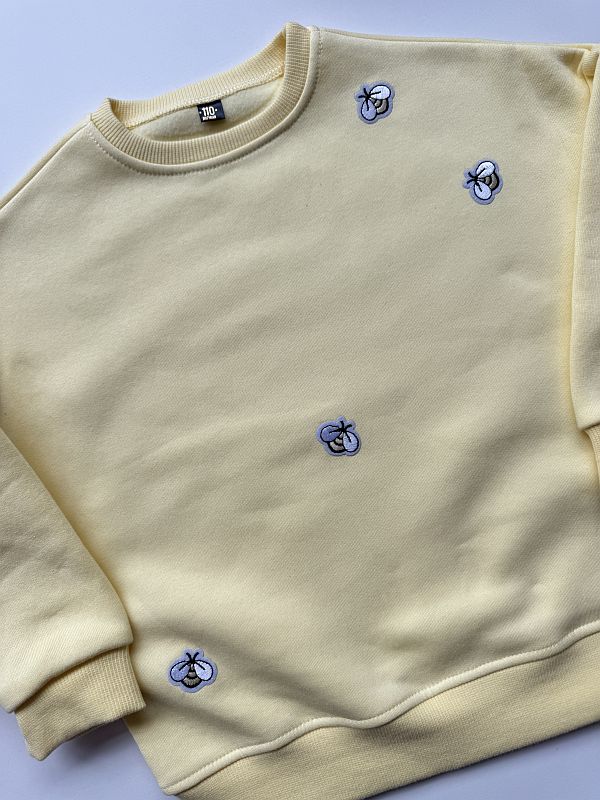 Bluza żółta z nadrukiem pszczółek rozmiar 110