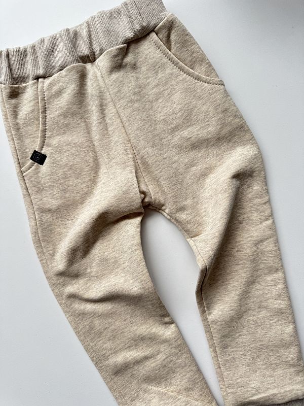 Spodnie dresowe beż melanż rozmiar 92