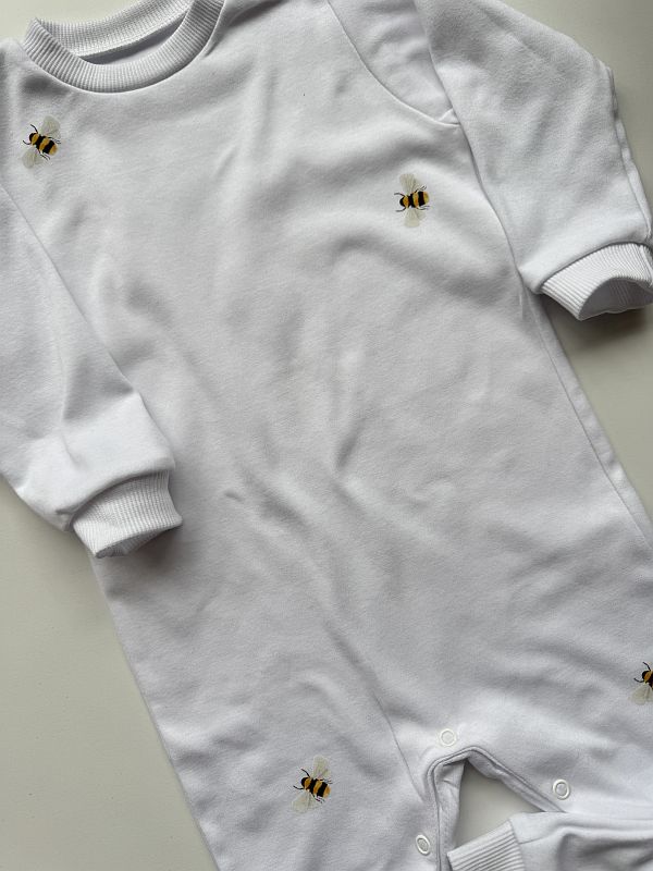 Pajac biały w pszczółki rozmiar 86