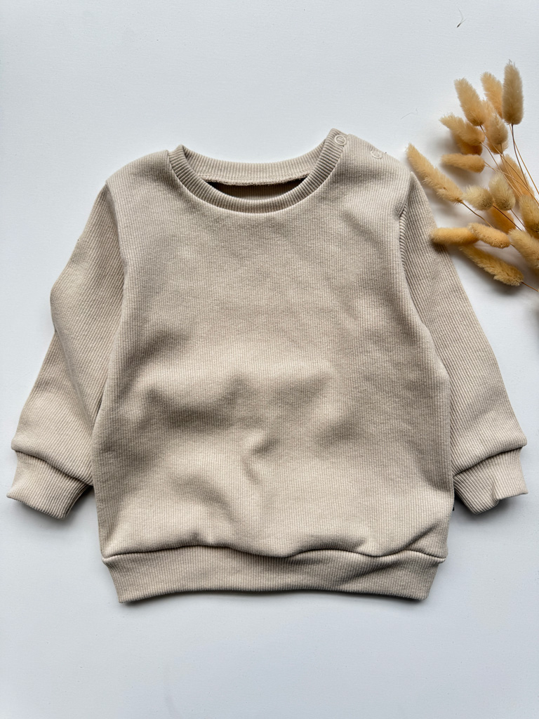 Prążkowana bluza jasnobeżowa rozmiar 74