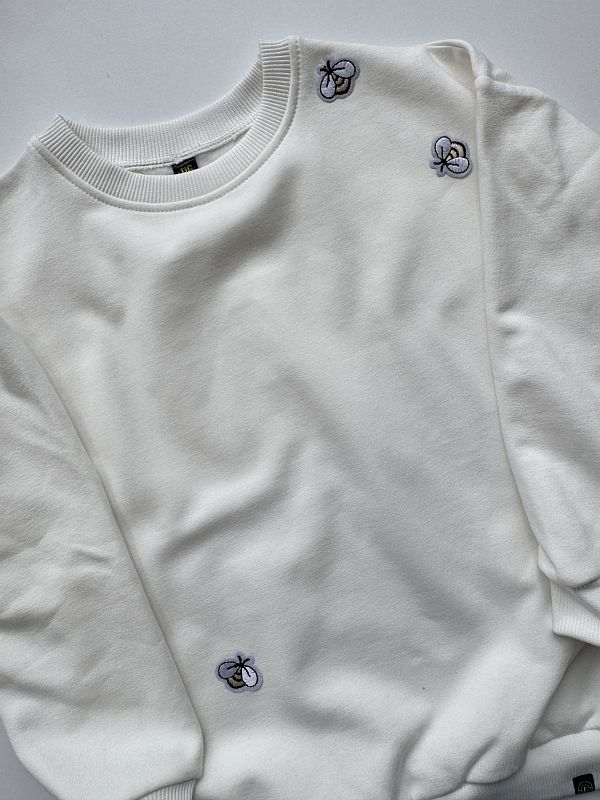 Bluza ecru z nadrukiem pszczółek rozmiar 116