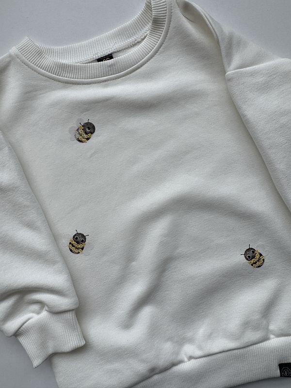 Bluza ecru z nadrukiem pszczółek rozmiar 86