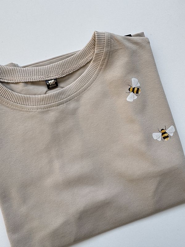Koszulka beżowa z krótkim rękawem pszczółki rozmiar 116