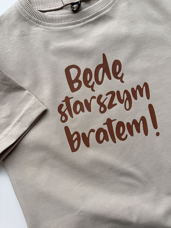 Koszulka bezowa z krótkim rękawem będę starszą siostrą rozmiar 98