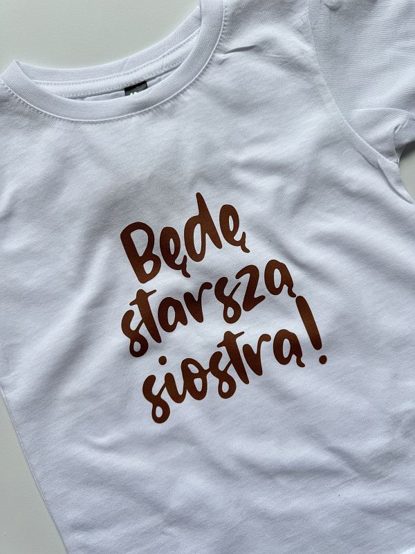 Koszulka biała z krótkim rękawem będę starszą siostrą rozmiar 104