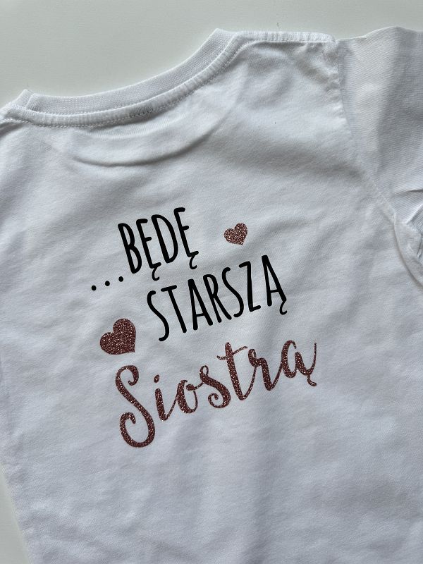 Koszulka biała z krótkim rękawem mam sekret będę starszą siostrą rozmiar 116