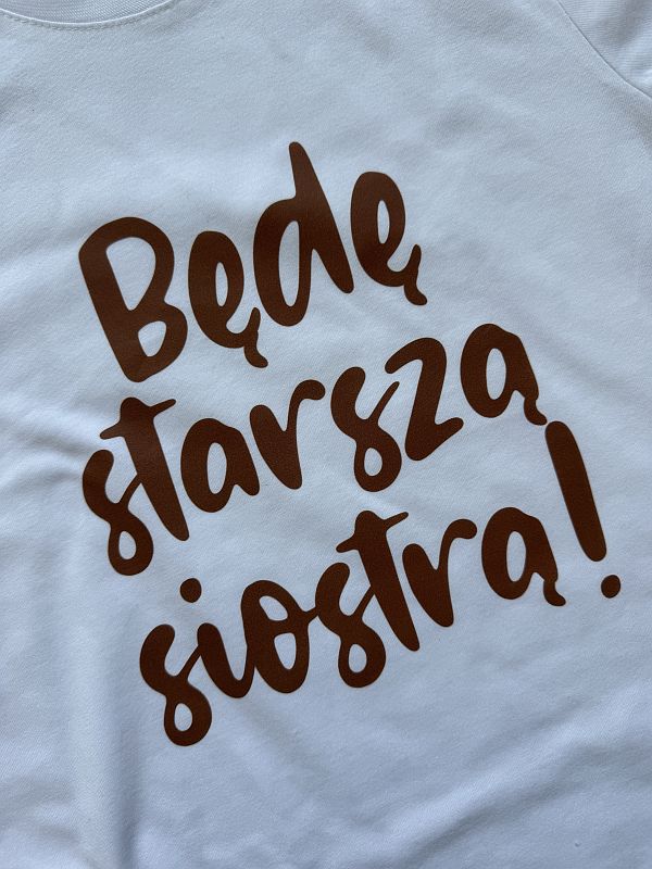 Koszulka biała z krótkim rękawem będę starszą siostrą rozmiar 134