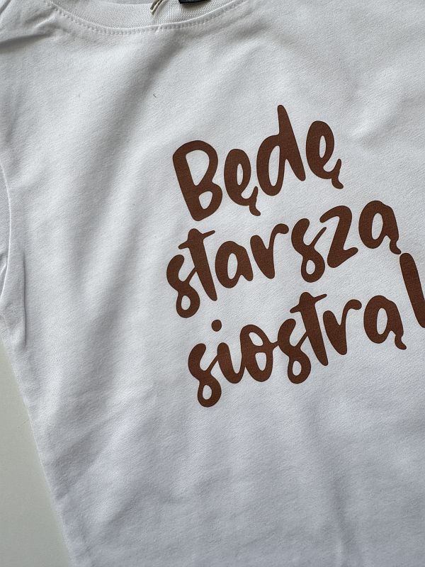 Koszulka biała z krótkim rękawem będę starszą siostrą rozmiar 110