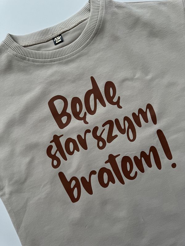 Koszulka beżowa z krótkim rękawem będę starszym bratem rozmiar 104